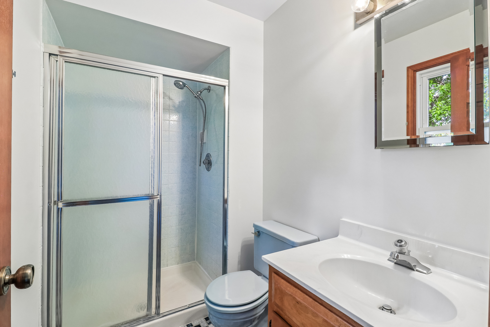 733 Buttonwood Circle Naperville, IL 60540 - Photo 6 of 39 a bathroom with a sink toilet and shower