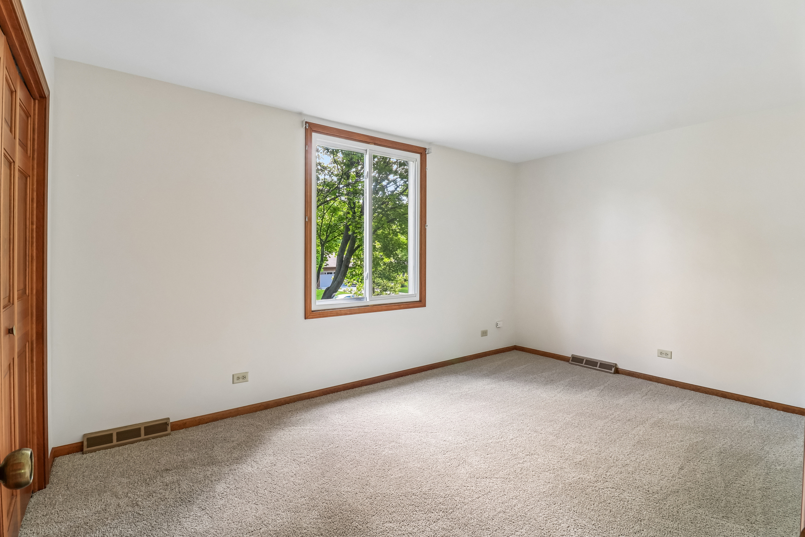 733 Buttonwood Circle Naperville, IL 60540 - Photo 10 of 39 an empty room with a window
