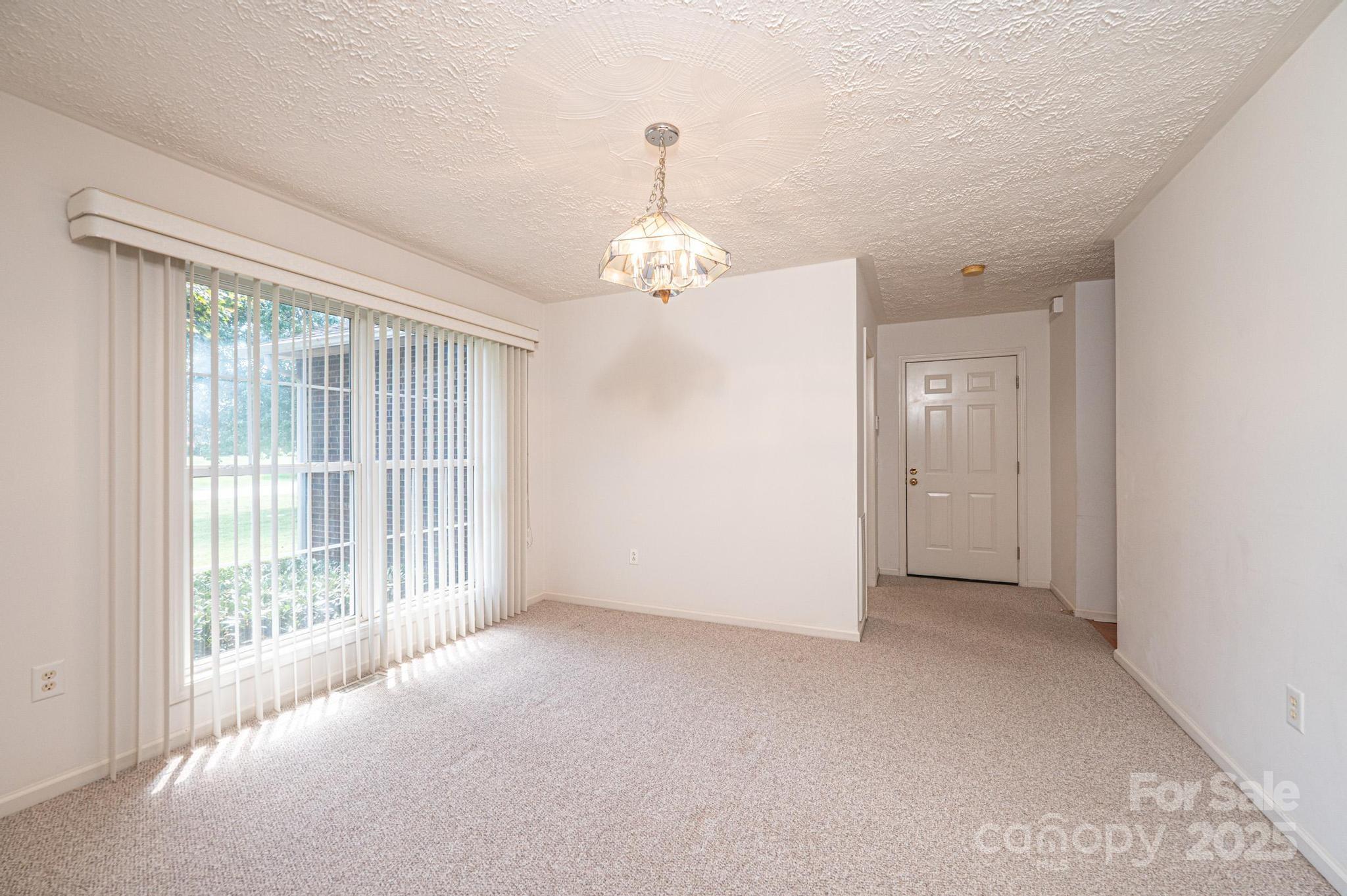 227 Robert Keever Road Stanley, NC 28164 - Photo 12 of 45 a view of a room with windows