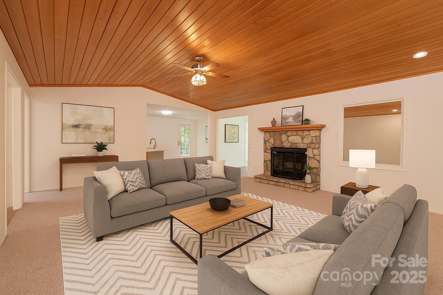 227 Robert Keever Road Stanley, NC 28164 - Photo 15 of 45 a living room with furniture a flat screen tv and a fireplace