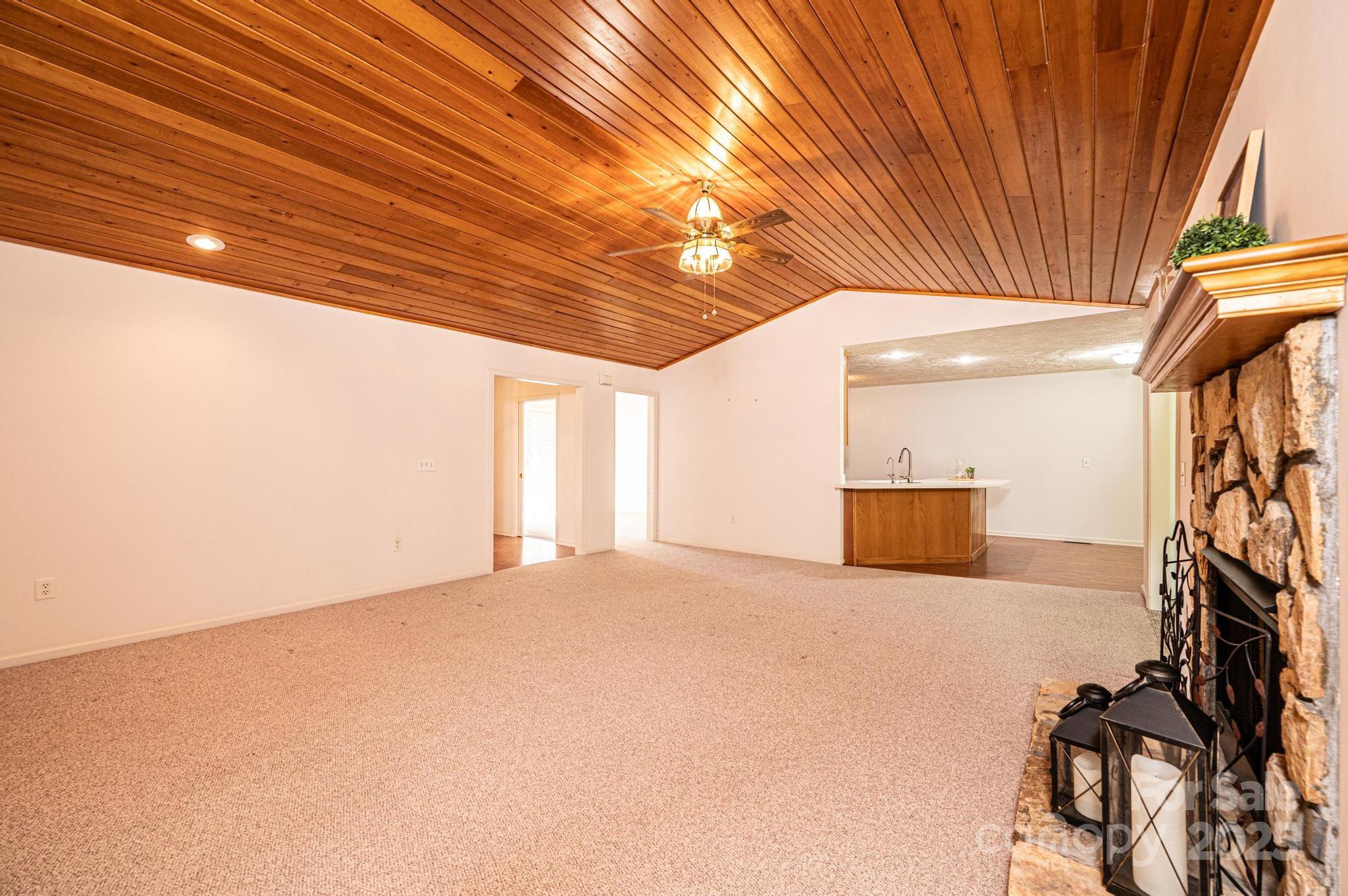 227 Robert Keever Road Stanley, NC 28164 - Photo 17 of 45 a view of an empty room with a window