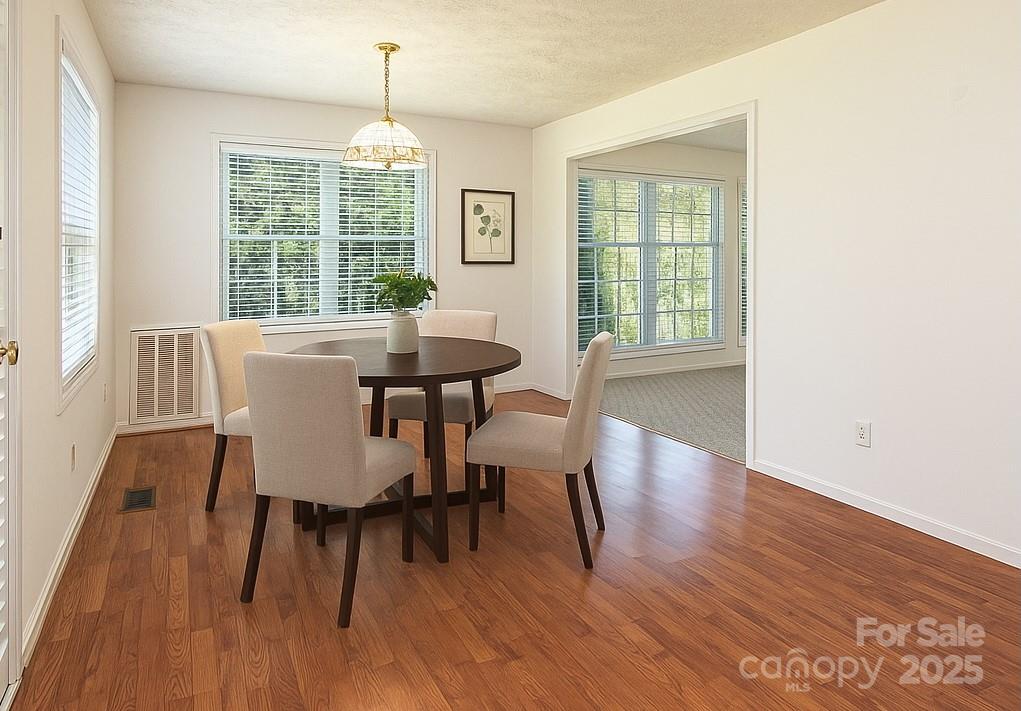 227 Robert Keever Road Stanley, NC 28164 - Photo 29 of 45 a view of a dining room with furniture window and outside view