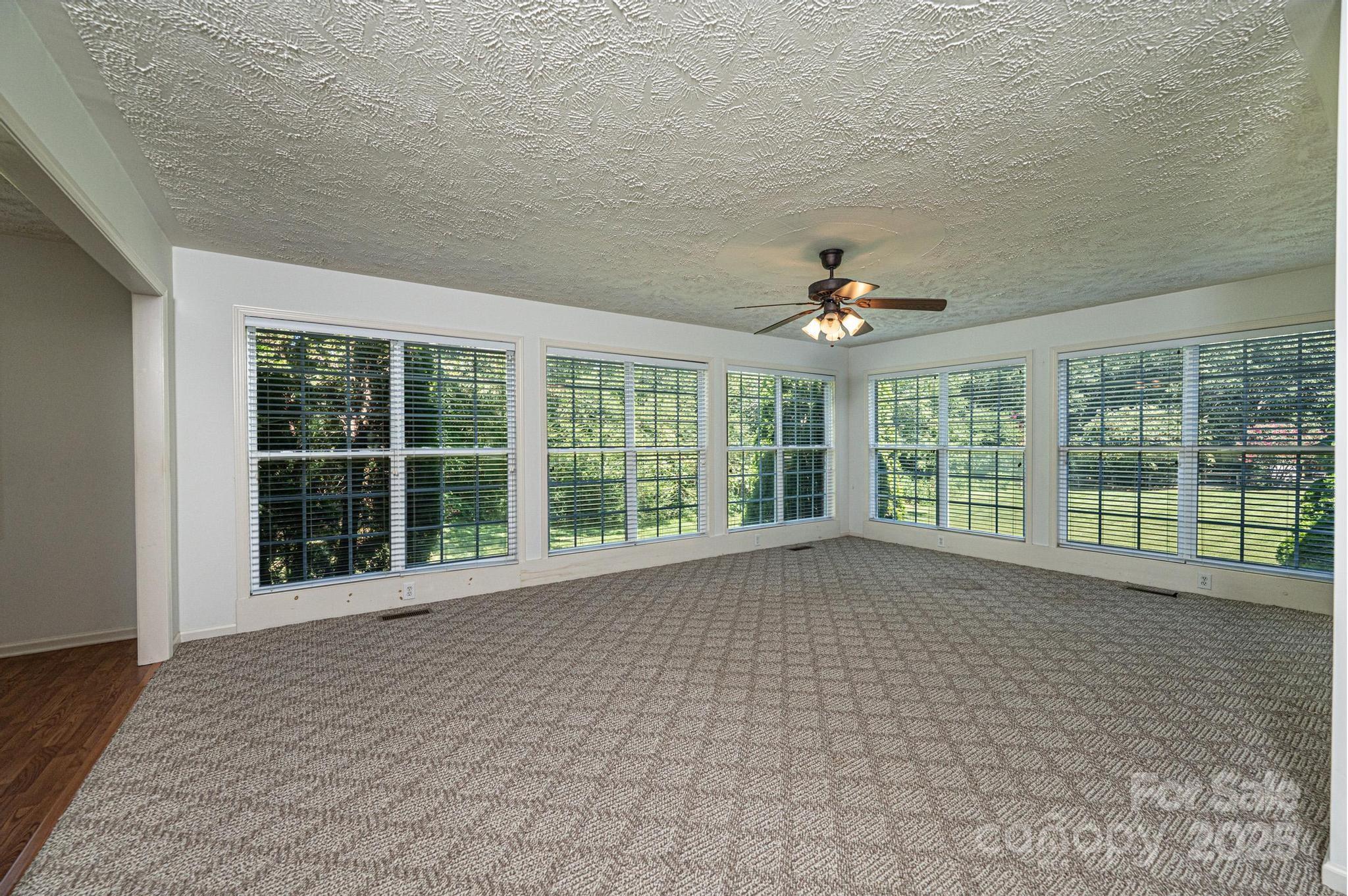 227 Robert Keever Road Stanley, NC 28164 - Photo 31 of 45 a view of an empty room with a window