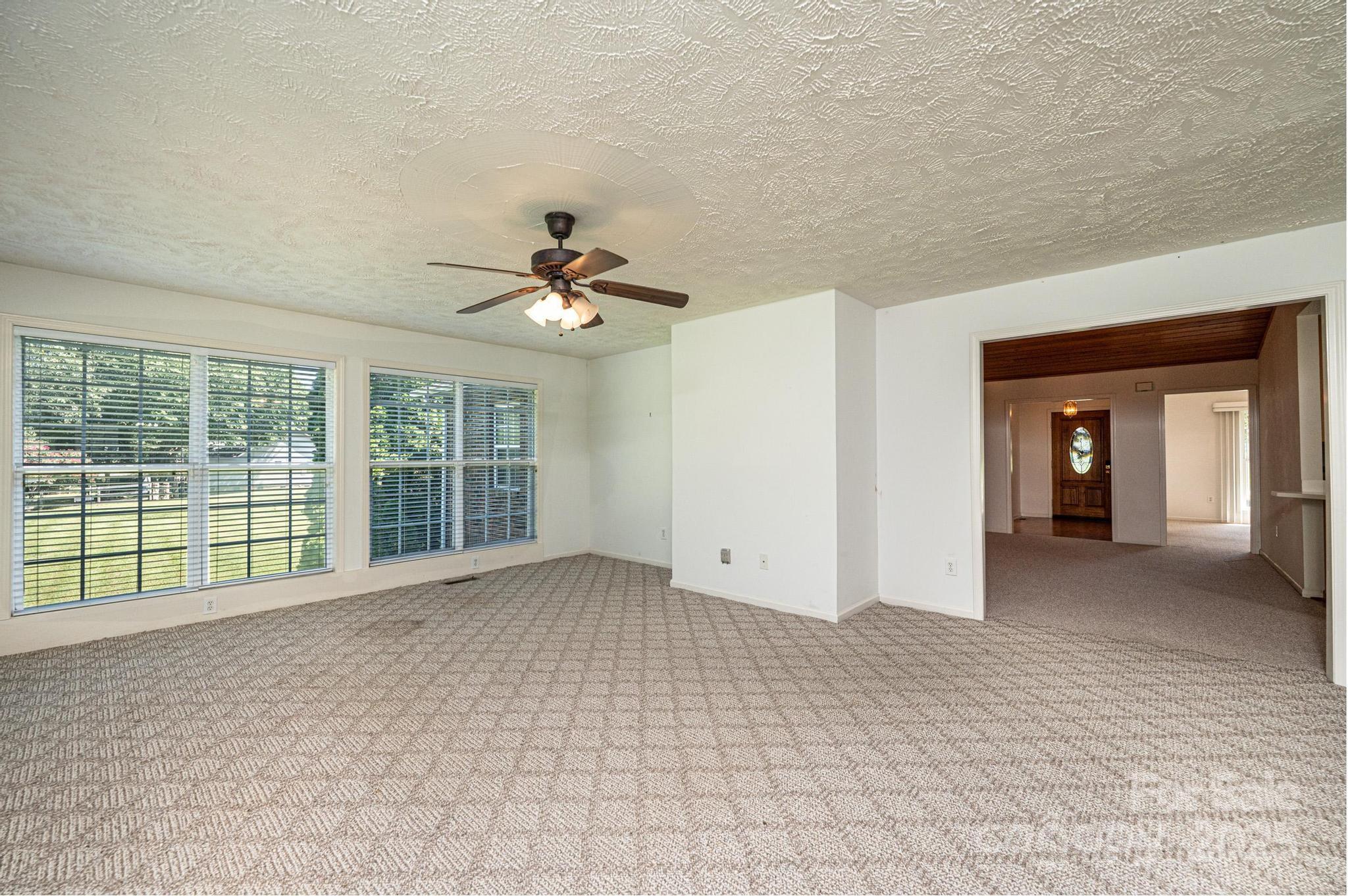 227 Robert Keever Road Stanley, NC 28164 - Photo 32 of 45 a view of empty room with windows
