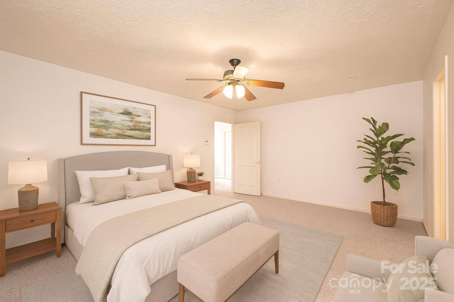 227 Robert Keever Road Stanley, NC 28164 - Photo 33 of 45 a bedroom with a chandelier and a potted plant