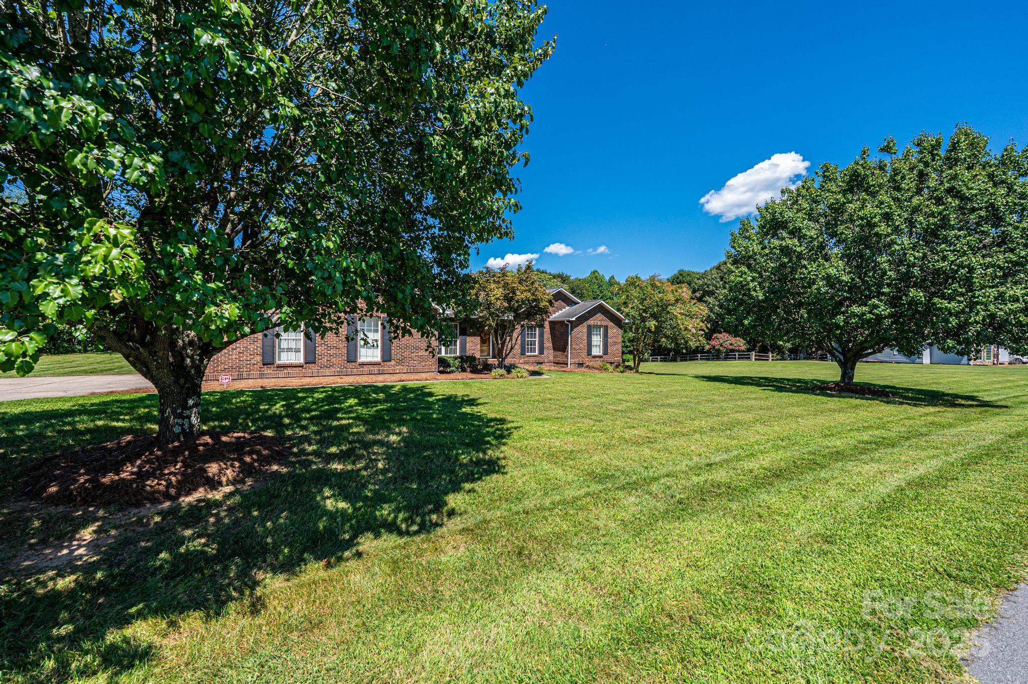 227 Robert Keever Road Stanley, NC 28164 - Photo 4 of 45 a view of green field