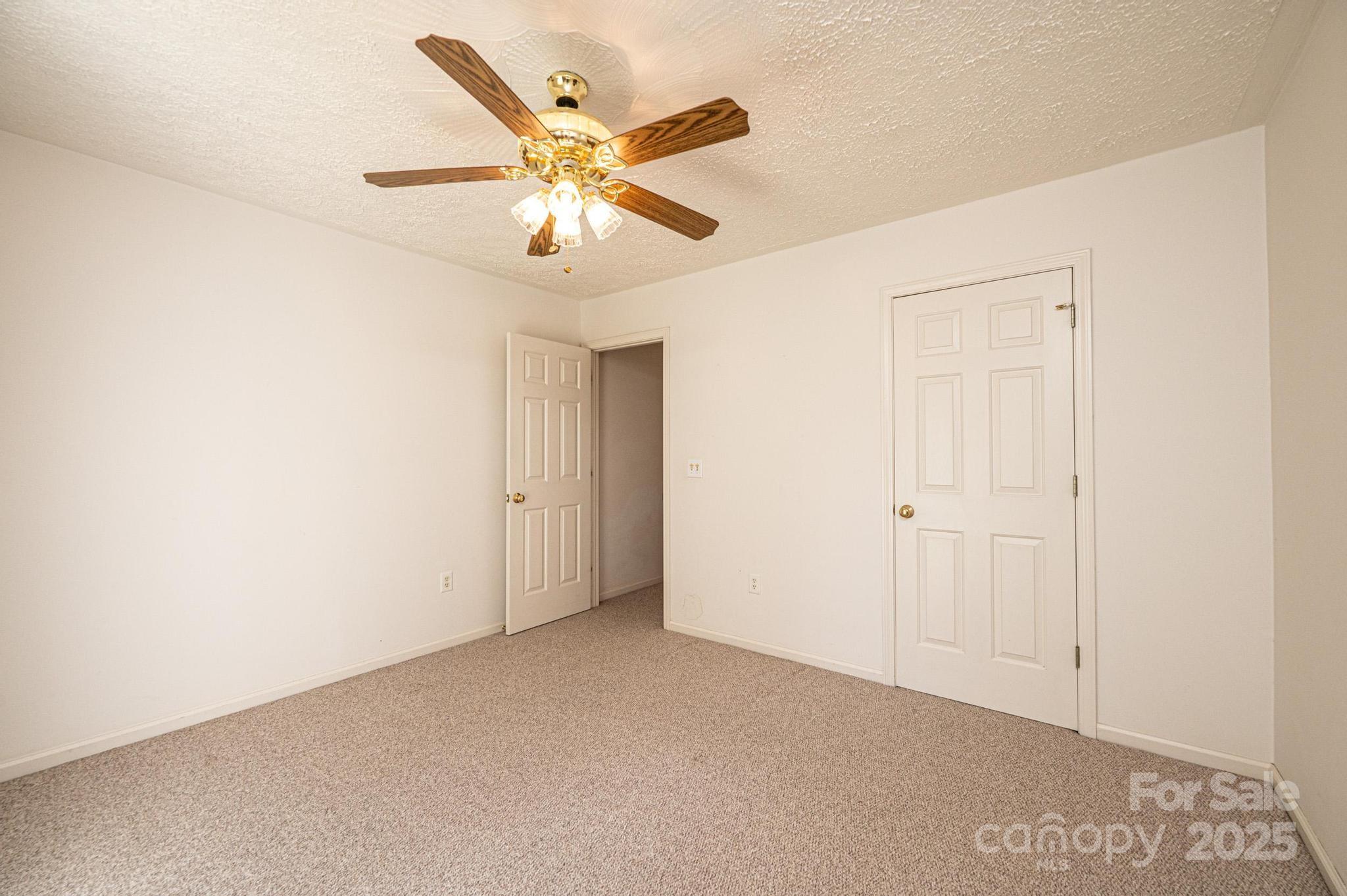 227 Robert Keever Road Stanley, NC 28164 - Photo 41 of 45 a view of an empty room