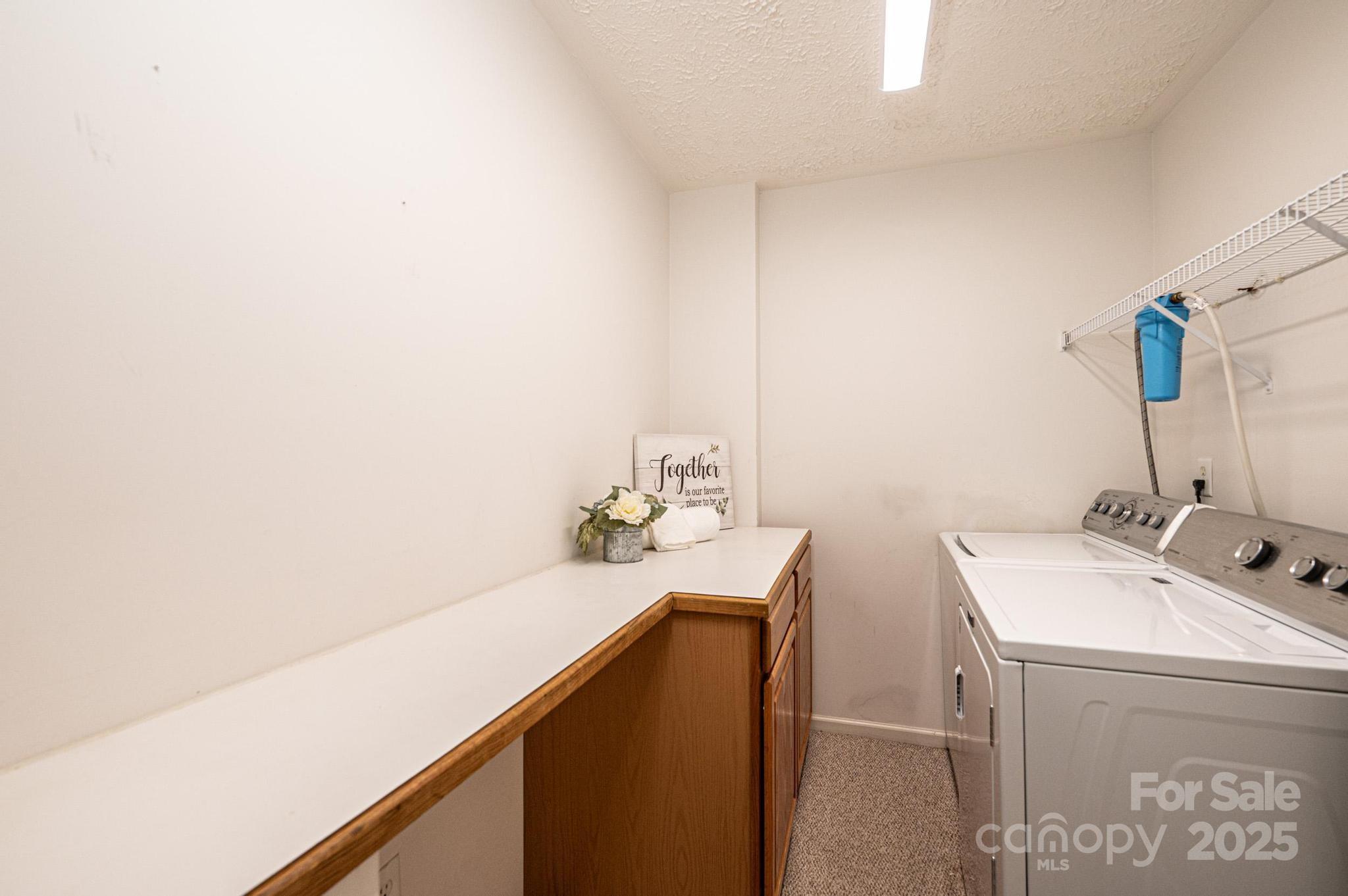 227 Robert Keever Road Stanley, NC 28164 - Photo 45 of 45 a bathroom with a sink and a mirror