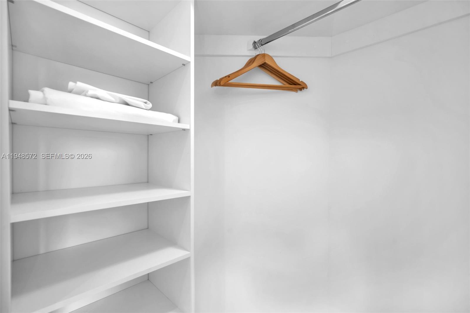 4010 South Ocean Drive, Unit R701 Hollywood, FL 33019 - Photo 19 of 46 a view of a room with rack on the wall