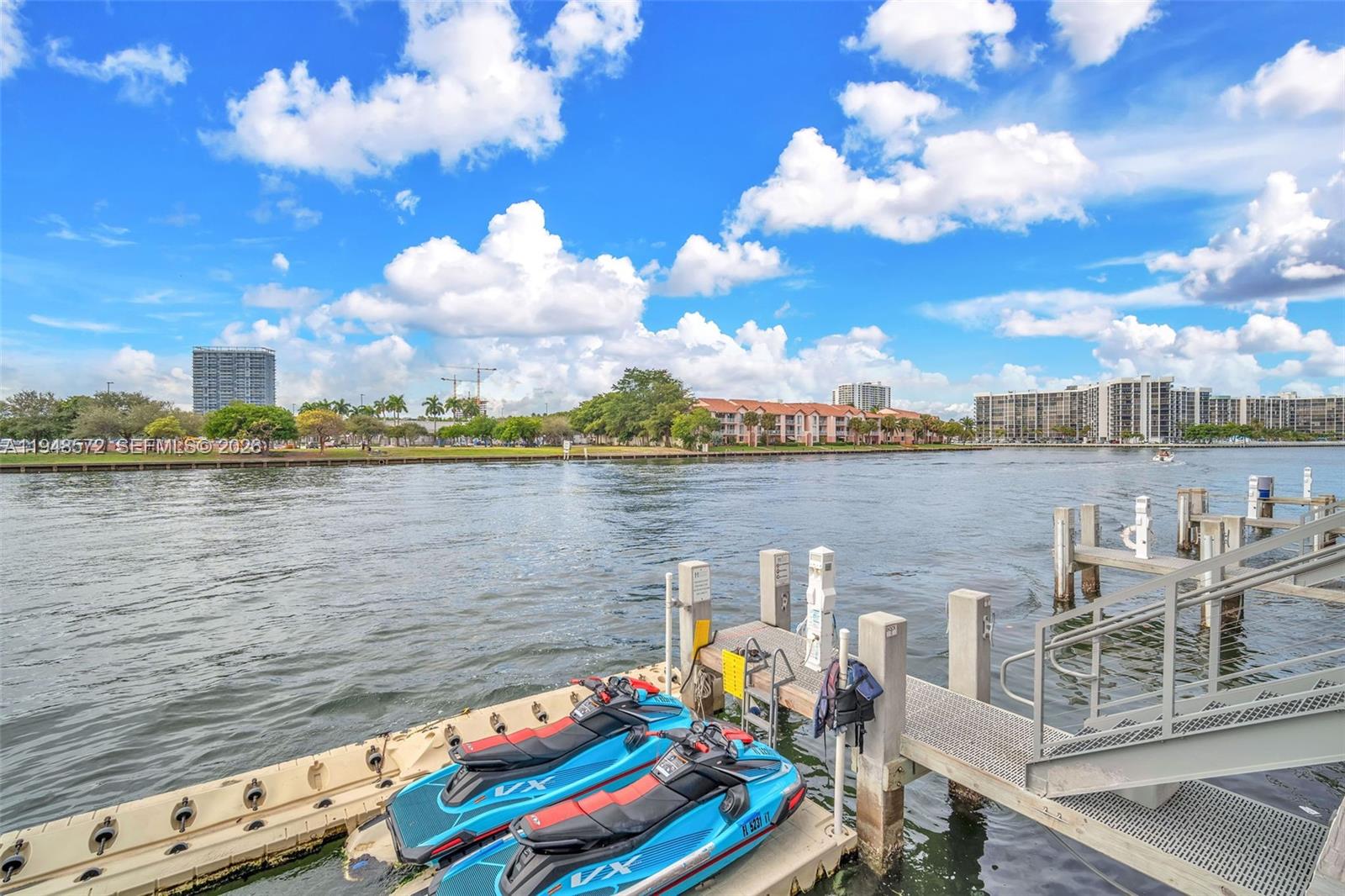 4010 South Ocean Drive, Unit R701 Hollywood, FL 33019 - Photo 43 of 46 a view of a lake with tables and chairs
