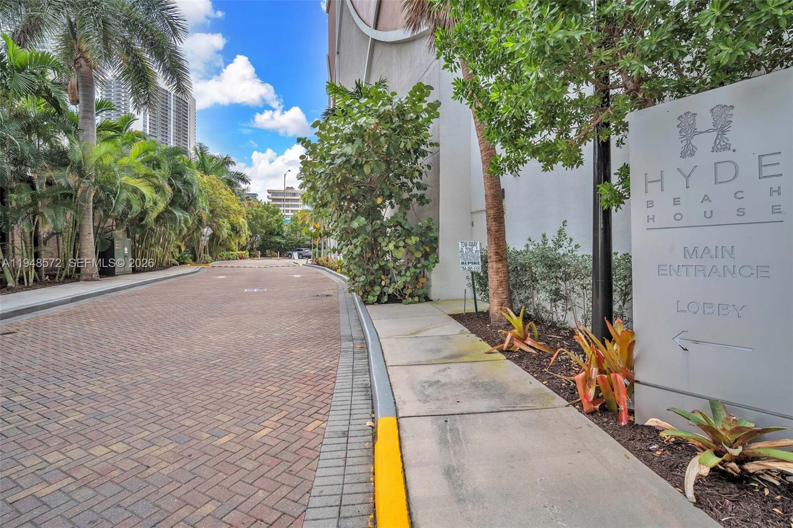 4010 South Ocean Drive, Unit R701 Hollywood, FL 33019 - Photo 46 of 46 a view of a pathway with a building in the background