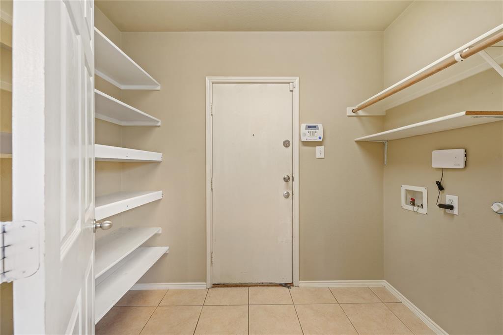 2003 Diamondback Forney, TX 75126 - Photo 13 of 30 Clothes washing area featuring washer hookup and light tile floors