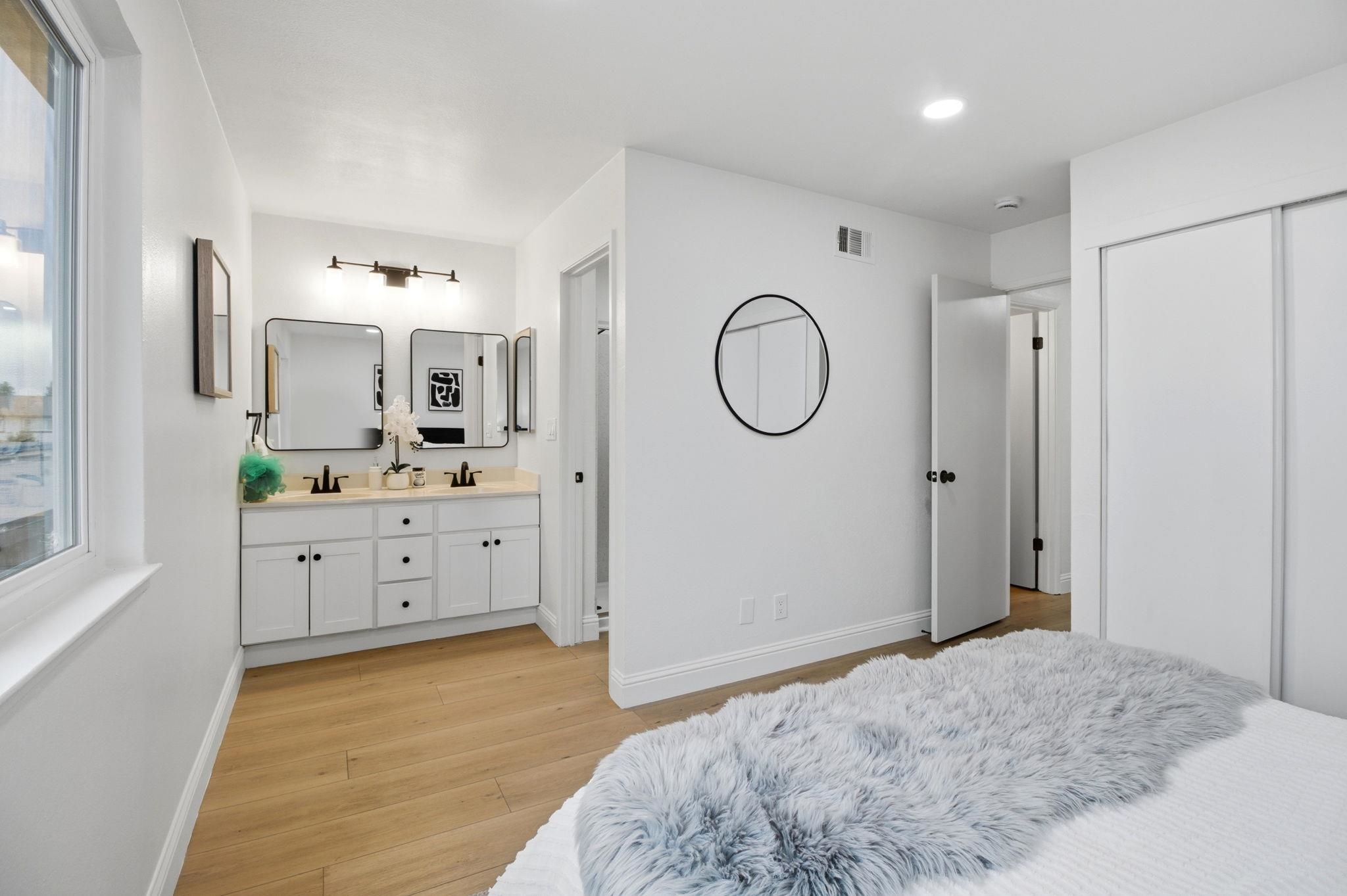 4304 Solano Way Union City, CA 94587 - Photo 19 of 34 a spacious bathroom with a double vanity sink mirror and shower
