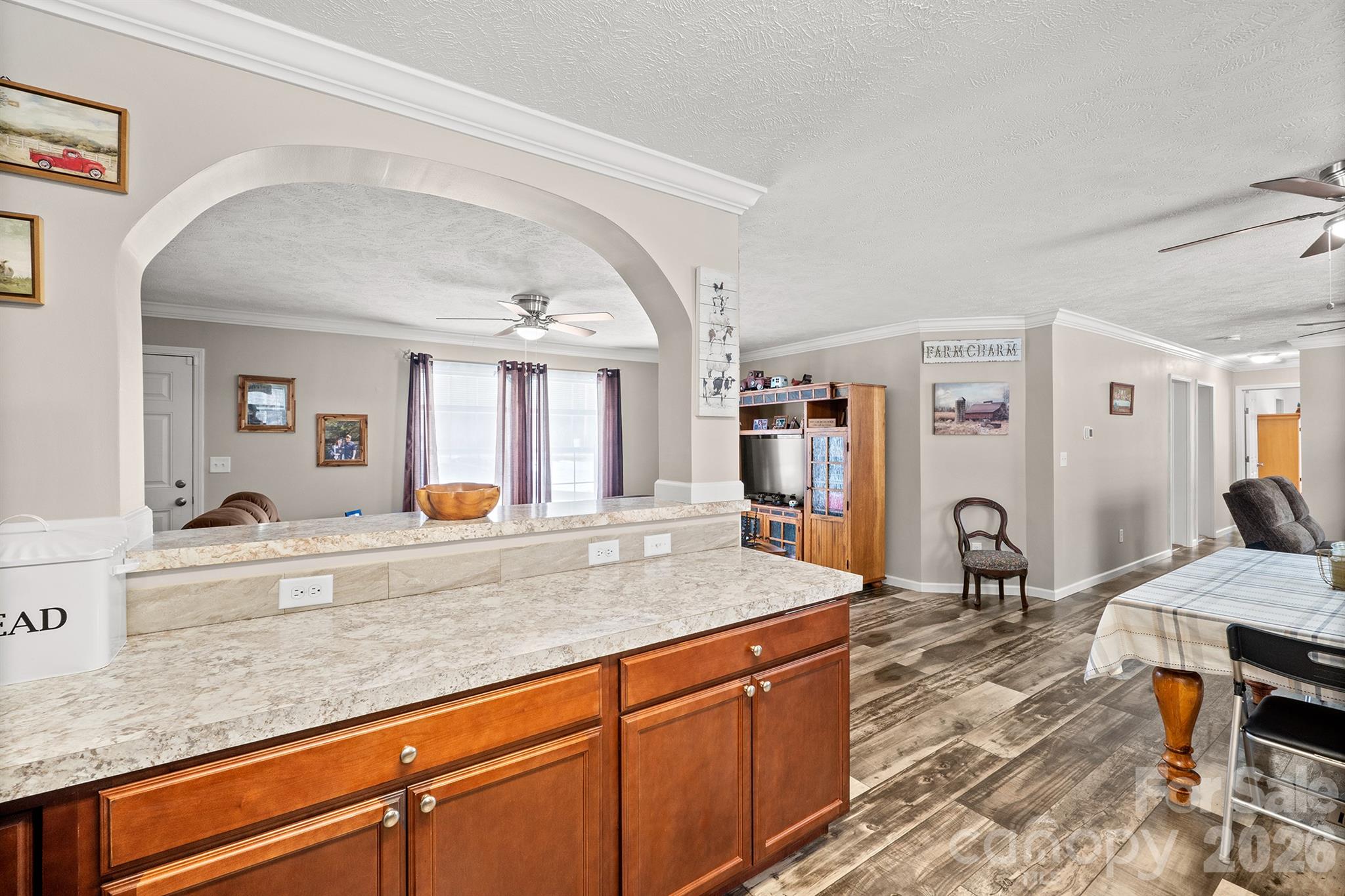 119 Marietta Road Mooresville, NC 28117 - Photo 15 of 38 a view of living room with granite countertop furniture and wooden floor