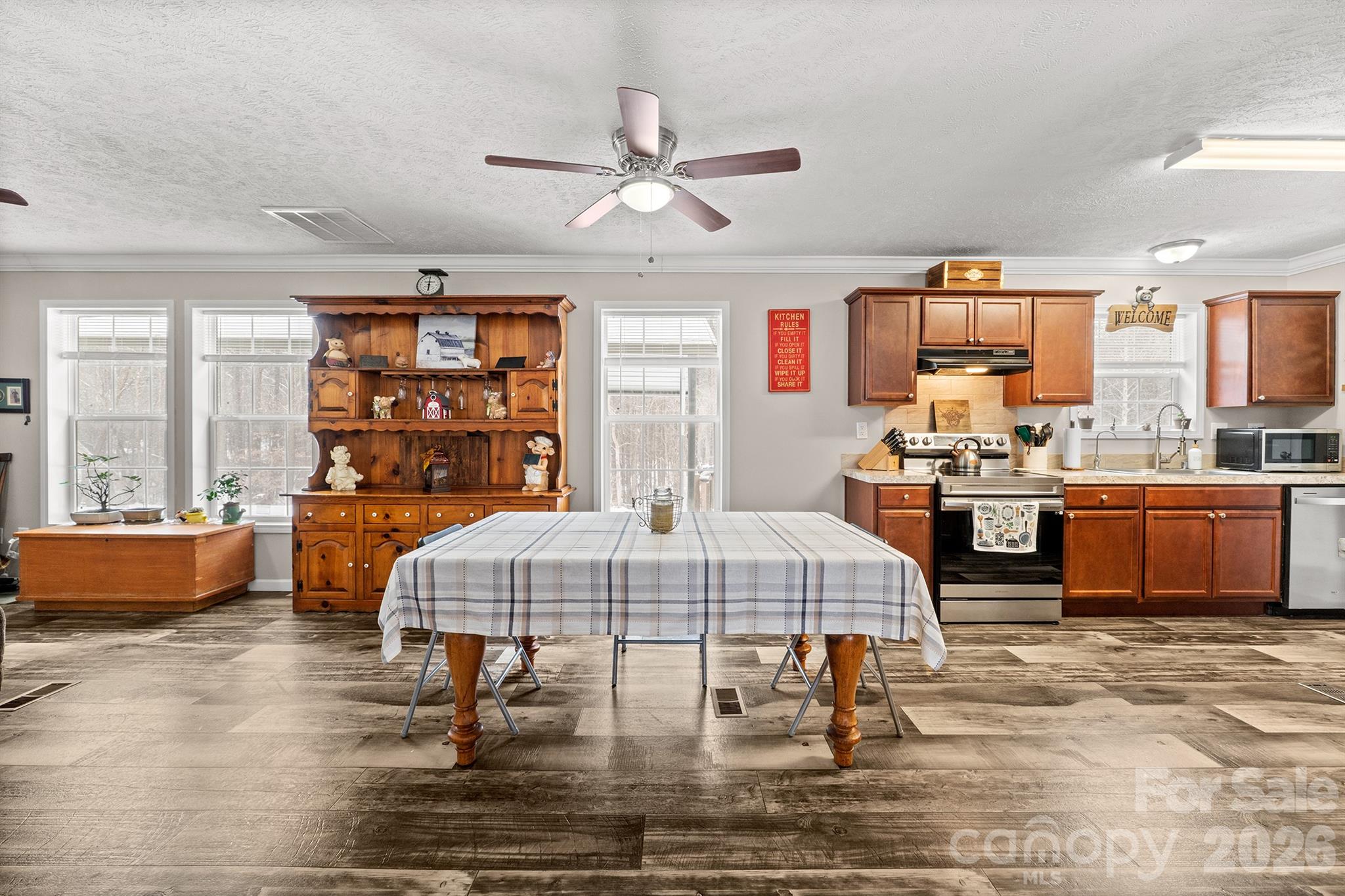 119 Marietta Road Mooresville, NC 28117 - Photo 16 of 38 a living room with furniture and a large window