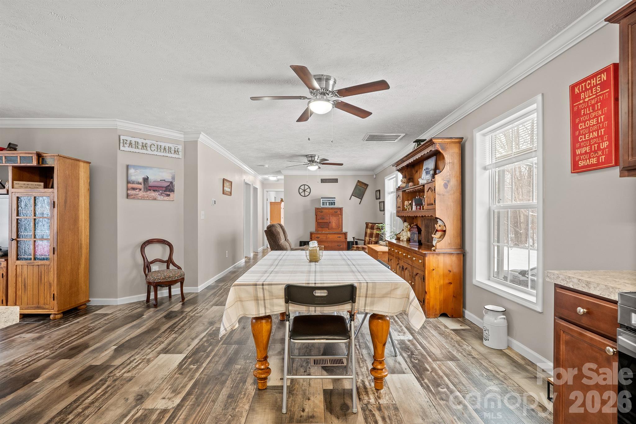 119 Marietta Road Mooresville, NC 28117 - Photo 17 of 38 a view of a dining room with furniture and wooden floor