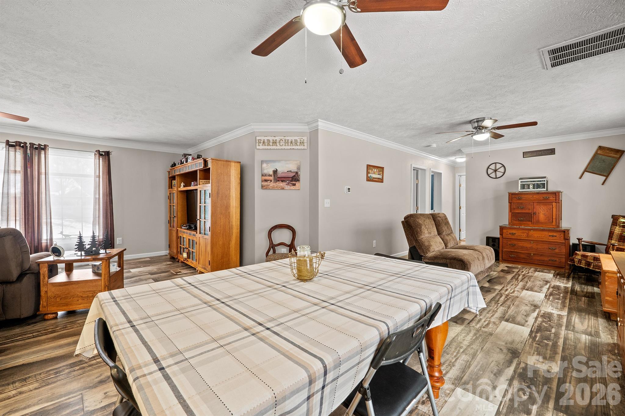 119 Marietta Road Mooresville, NC 28117 - Photo 18 of 38 a bedroom with a bed and wooden floor