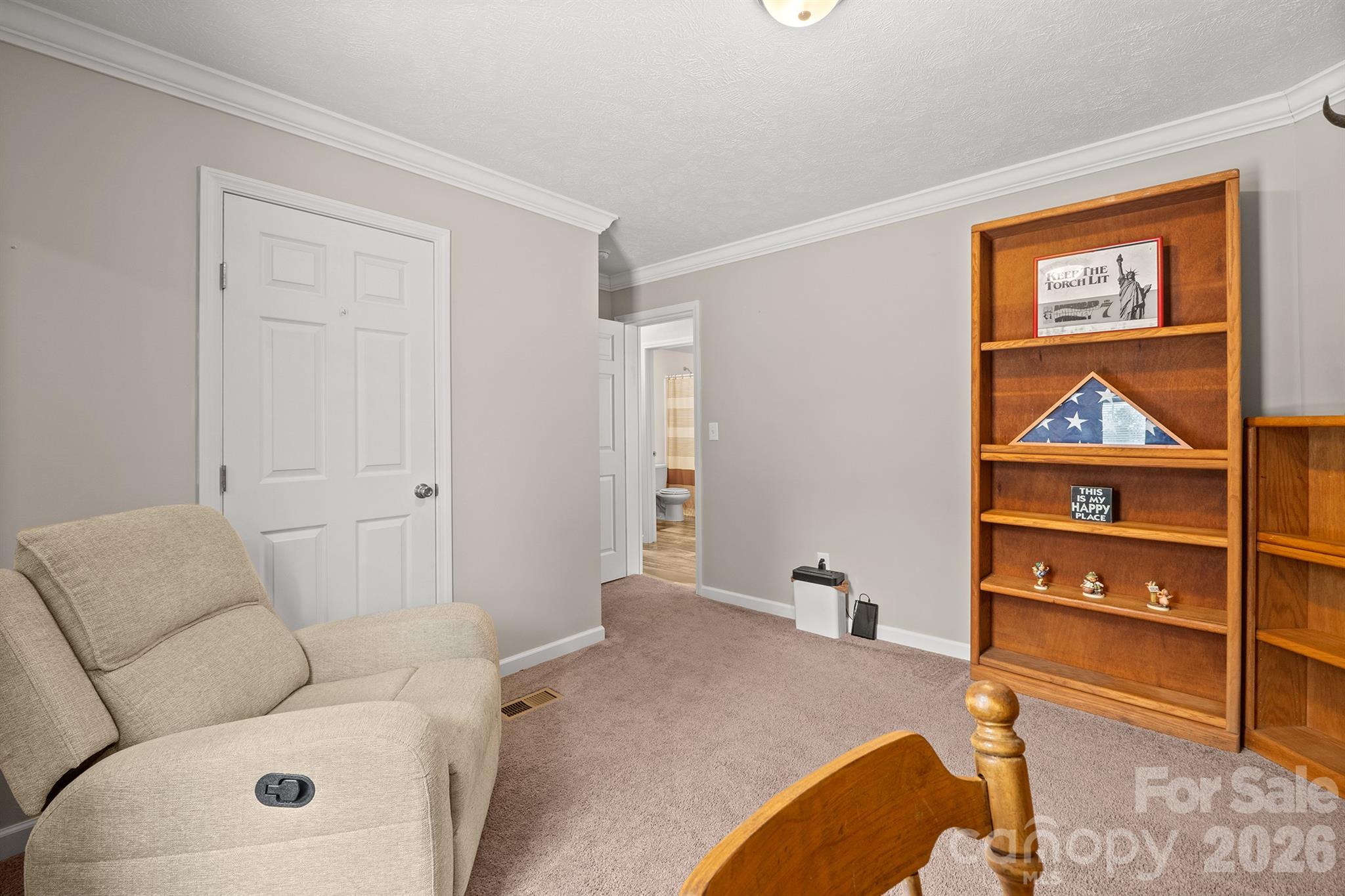 119 Marietta Road Mooresville, NC 28117 - Photo 27 of 38 a bedroom with a bed and closet