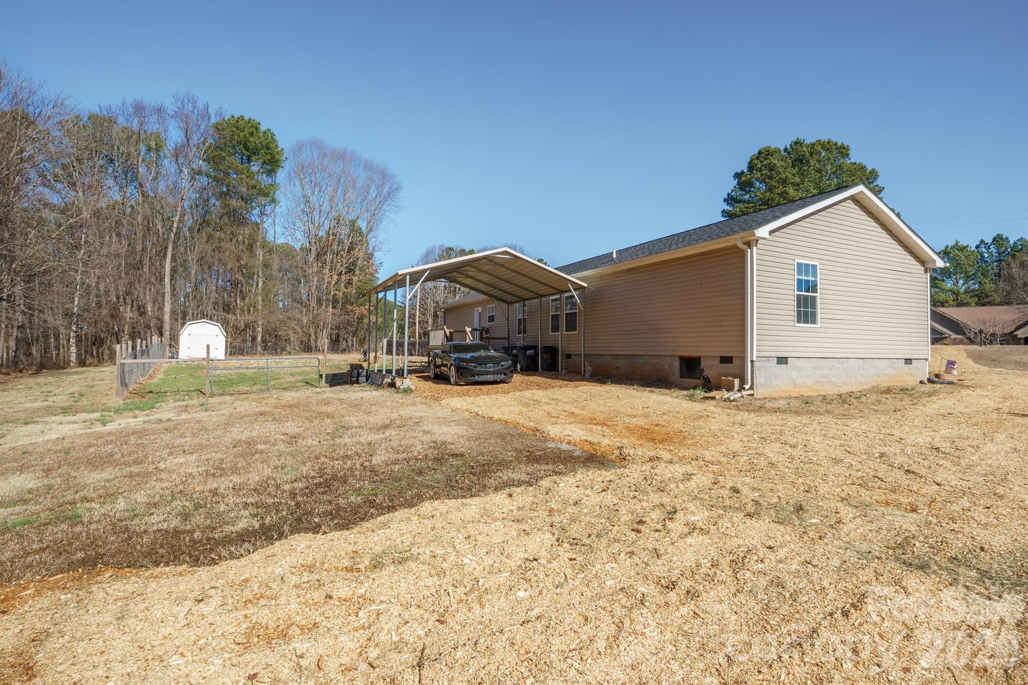 119 Marietta Road Mooresville, NC 28117 - Photo 33 of 38 a view of large house with a yard