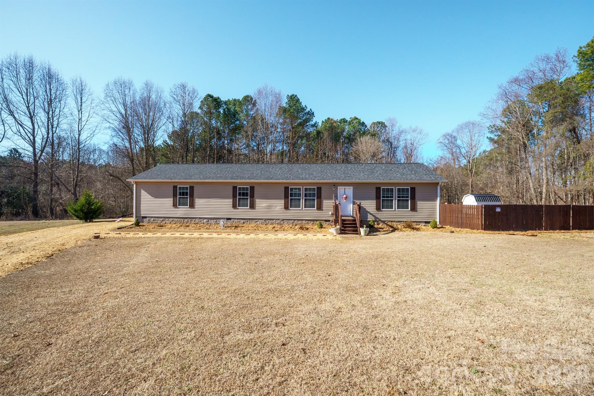 119 Marietta Road Mooresville, NC 28117 - Photo 4 of 38 a front view of house with yard patio and swimming pool