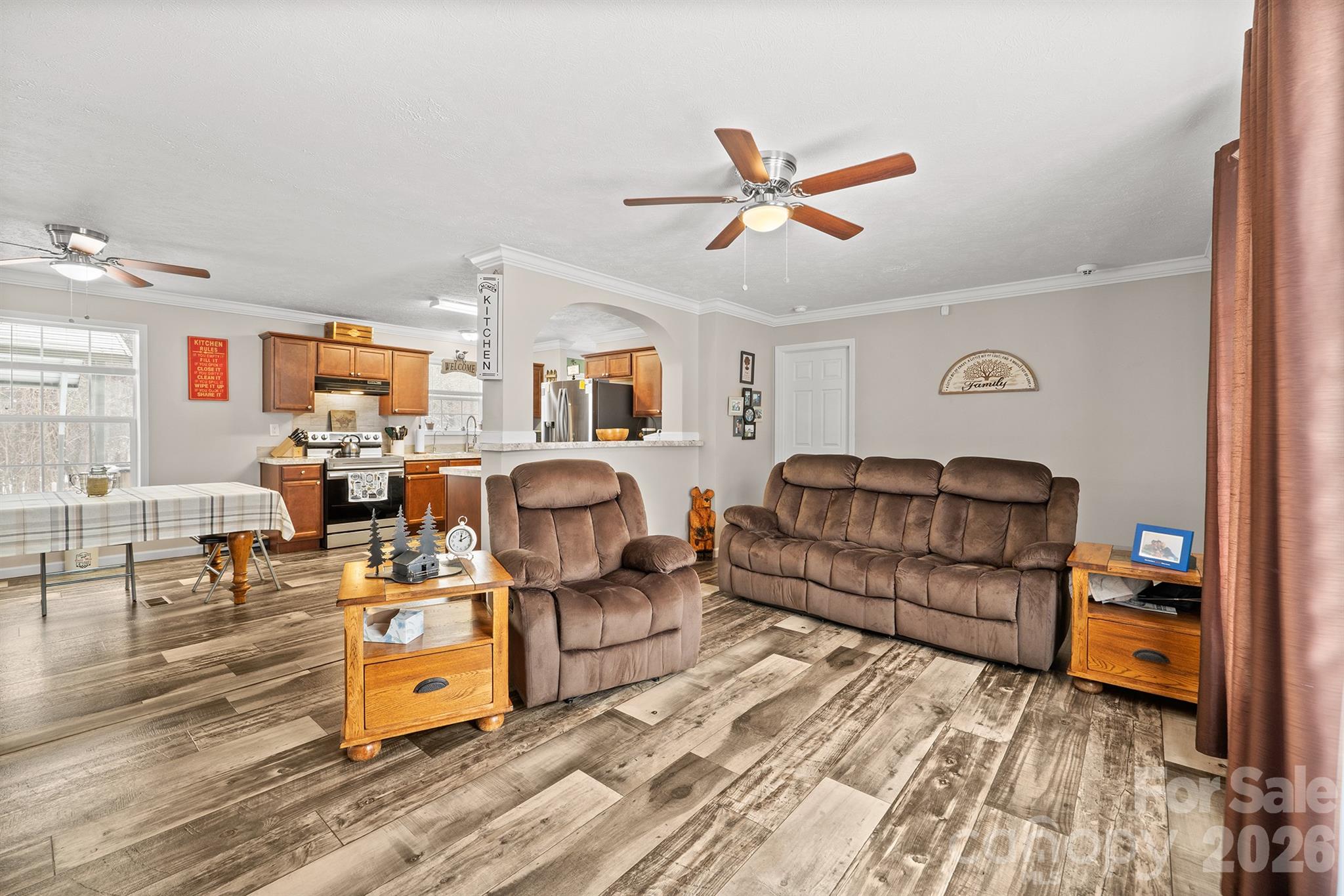119 Marietta Road Mooresville, NC 28117 - Photo 7 of 38 a living room with furniture and a wooden floor