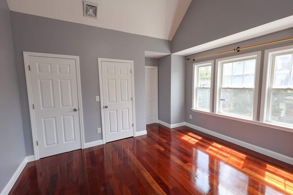70 Mt Hope Street, Unit 2 Boston, MA 02131 - Photo 6 of 19 a view of an empty room and window