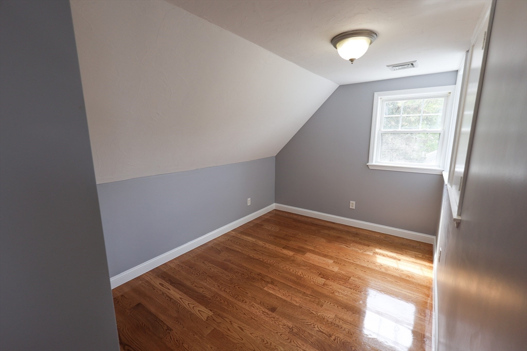 70 Mt Hope Street, Unit 2 Boston, MA 02131 - Photo 9 of 19 an empty room with a window