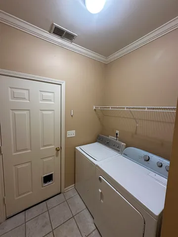 a kitchen with stainless steel appliances granite countertop a sink and a stove top oven