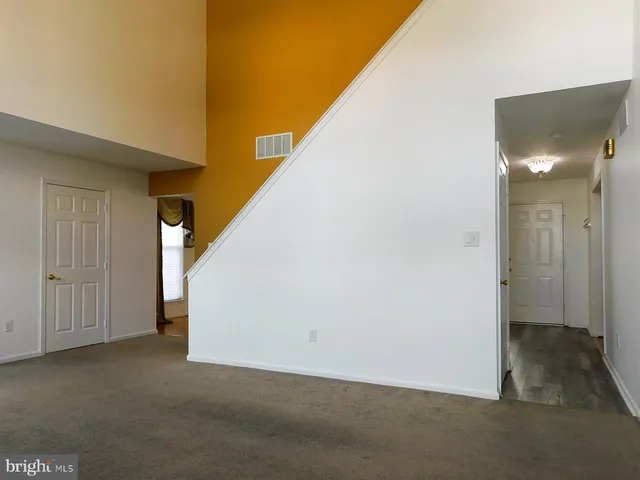 a bathroom with a tub and a sink