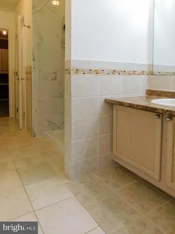 wooden floor in an empty room with a fireplace