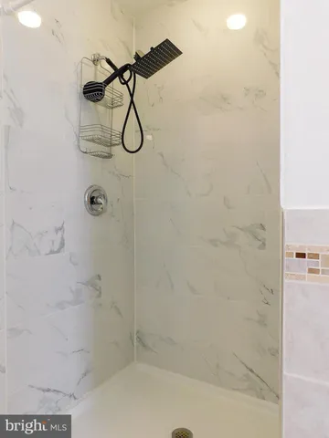 a view of room with wooden floor