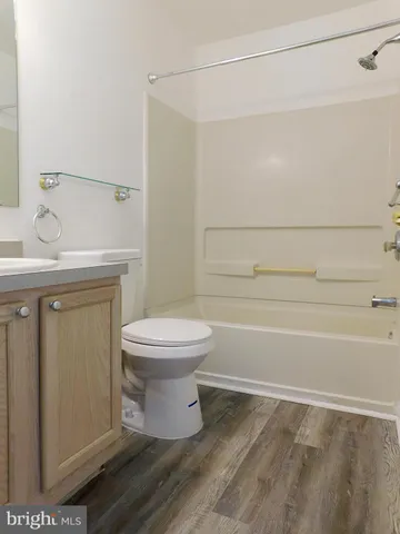 a backyard of a house with a garden and plants