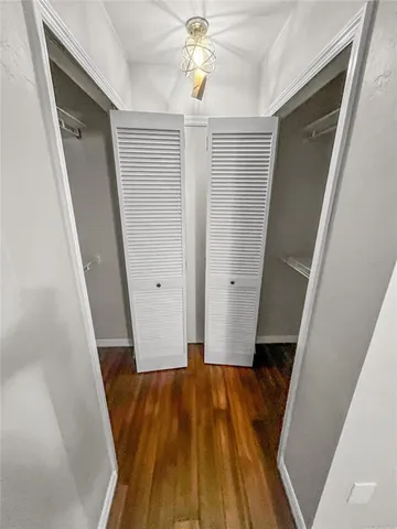 a view of entryway with wooden floor