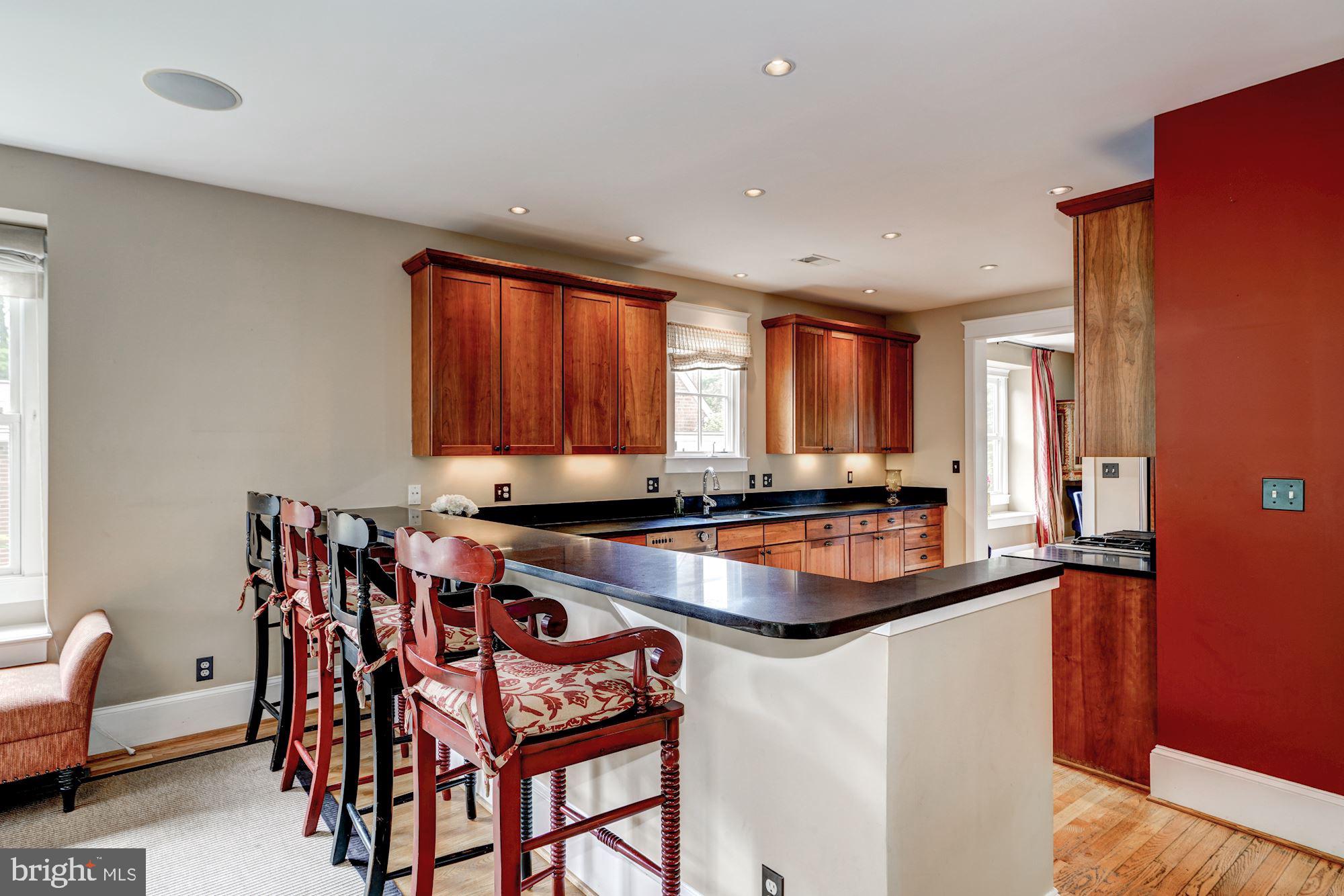 3706 6th Road North Arlington, VA 22203 - Photo 14 of 36 Breakfast bar opens to family room