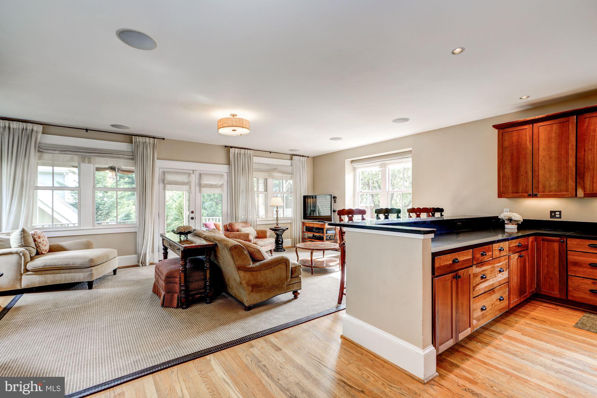 3706 6th Road North Arlington, VA 22203 - Photo 16 of 36 Big family room open to screened porch on south