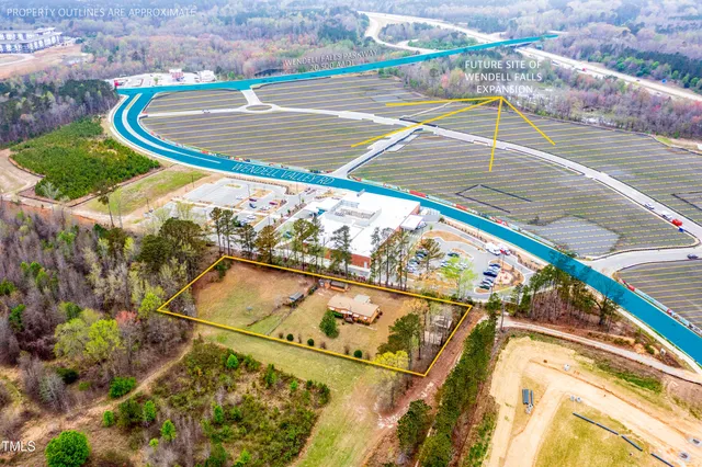 a view of a swimming pool from a lake