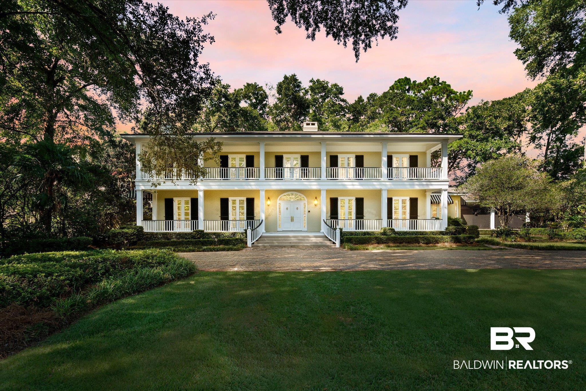 54 Turnin Lane Mobile, AL 36608 - Photo 1 of 35 Neoclassical home with a balcony, a porch, and a lawn
