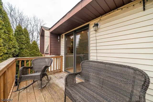 a view of a chair and table on the wooden floor