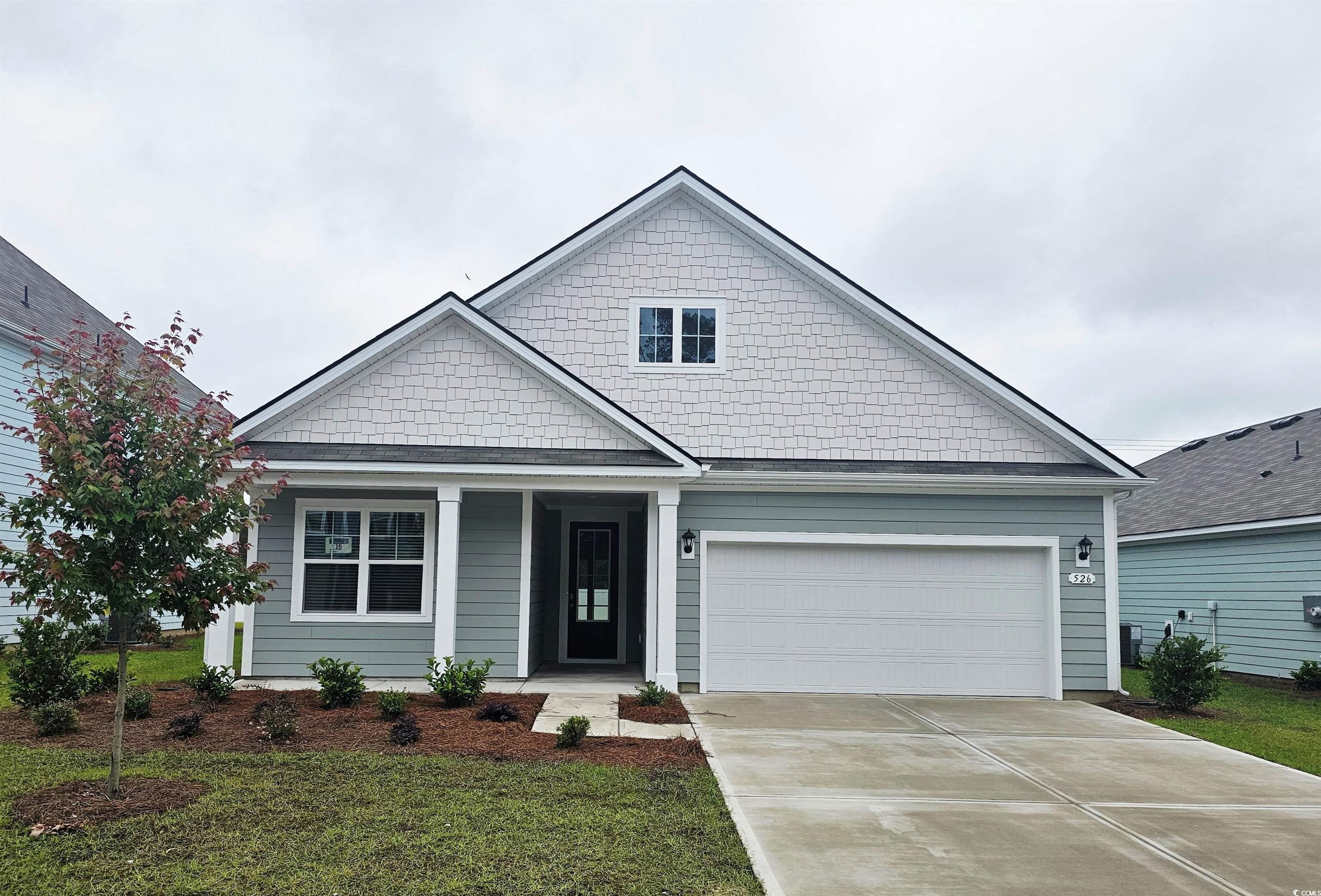 526 Haven View Way Murrells Inlet, SC 29576 - Photo 1 of 31 View of front facade with driveway, covered porch,