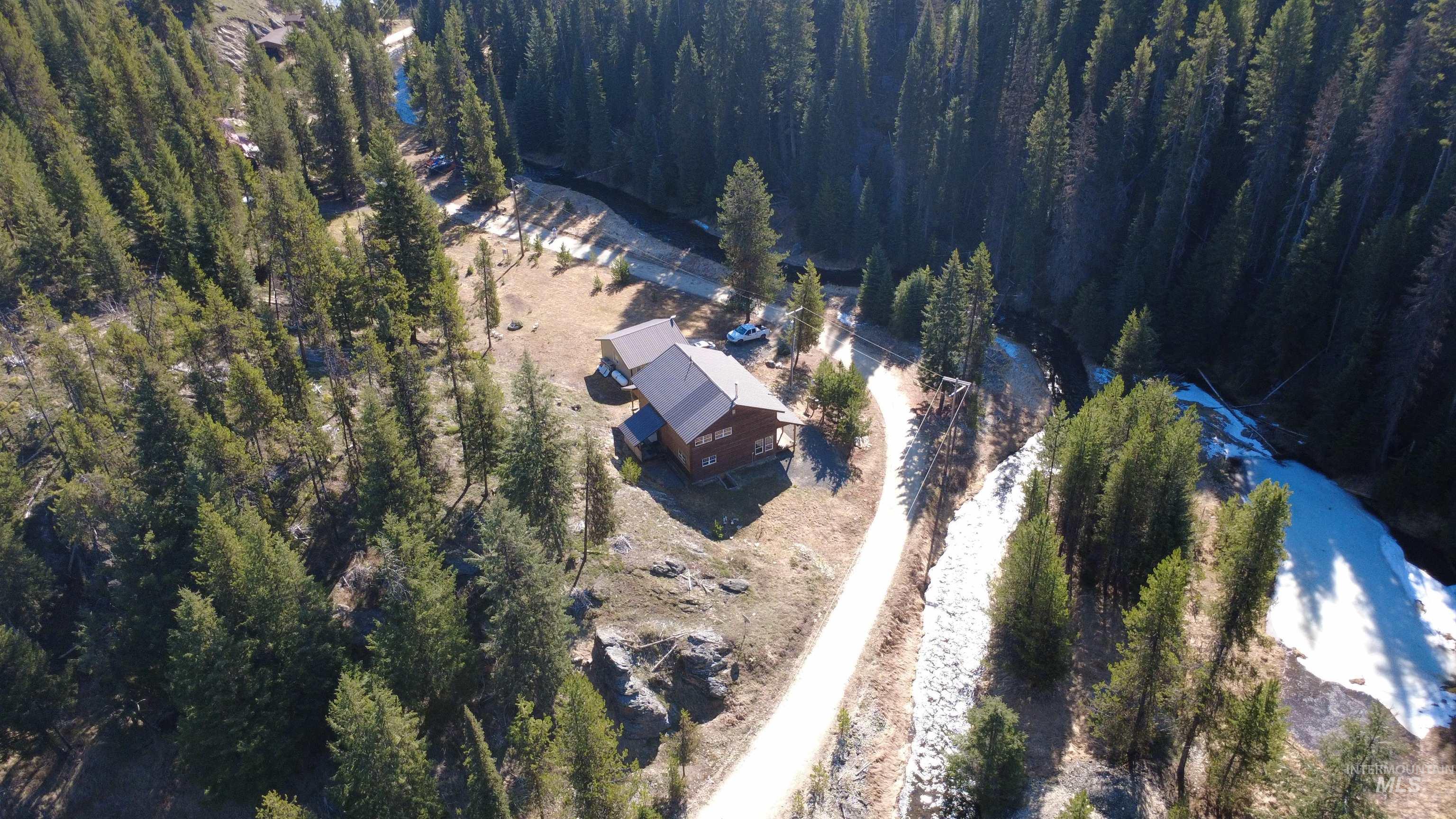 4250 American River Road Elk City, ID 83525 - Photo 31 of 46 Aerial overview of property's location featuring a heavily wooded area