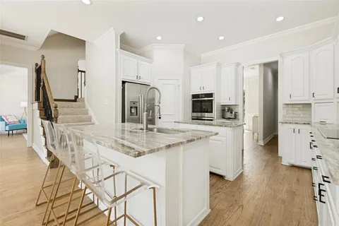 a view of a living room and balcony