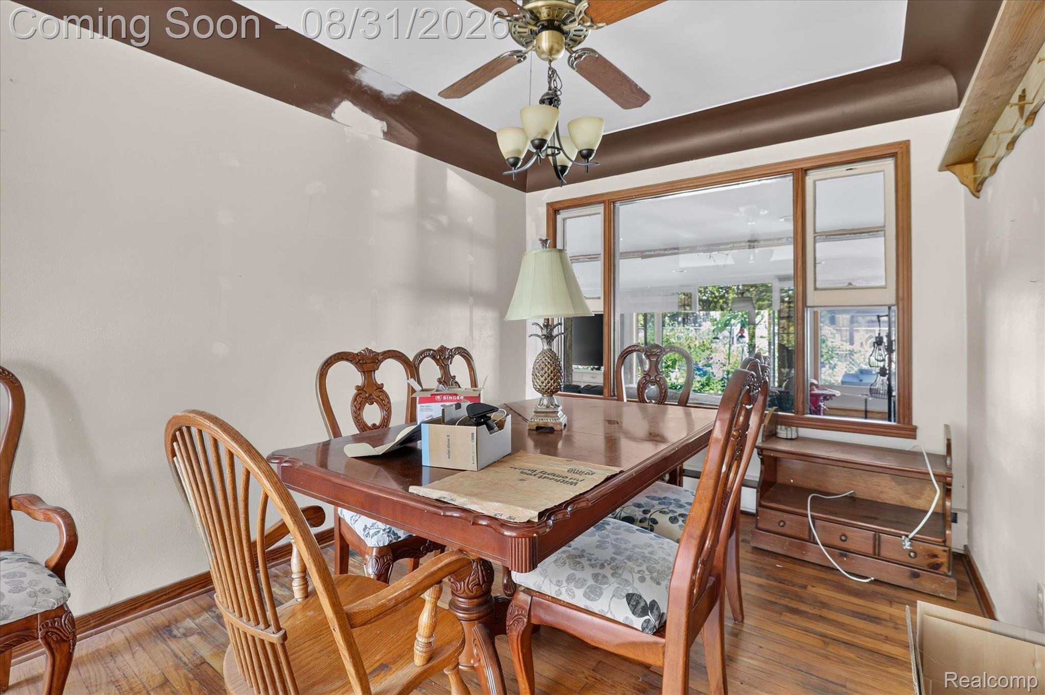 10165 Talladay Road Willis, MI 48191 - Photo 16 of 56 Wood-finish flooring, ceiling fan with integrated lighting, and multiple pane windows