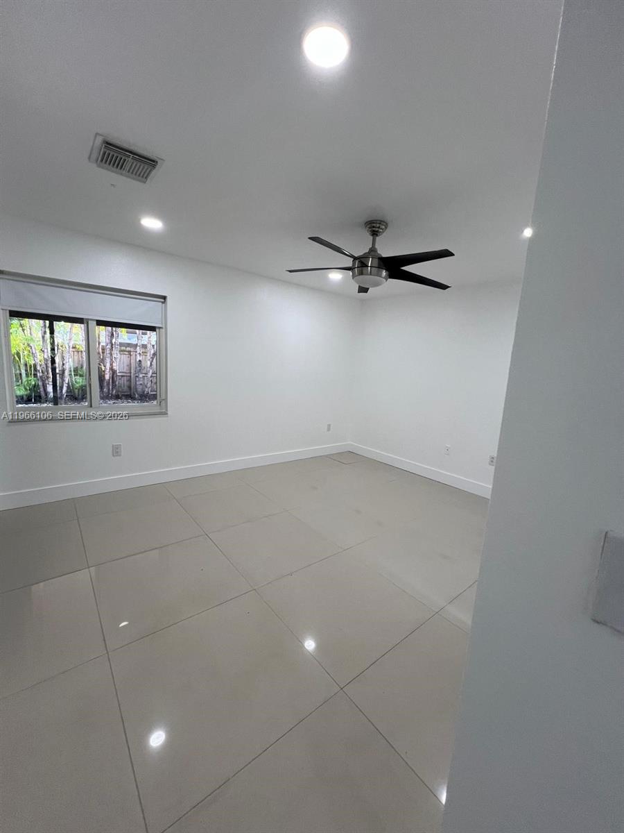11320 Southwest 245th Street Homestead, FL 33032 - Photo 13 of 21 a view of an empty room with a window