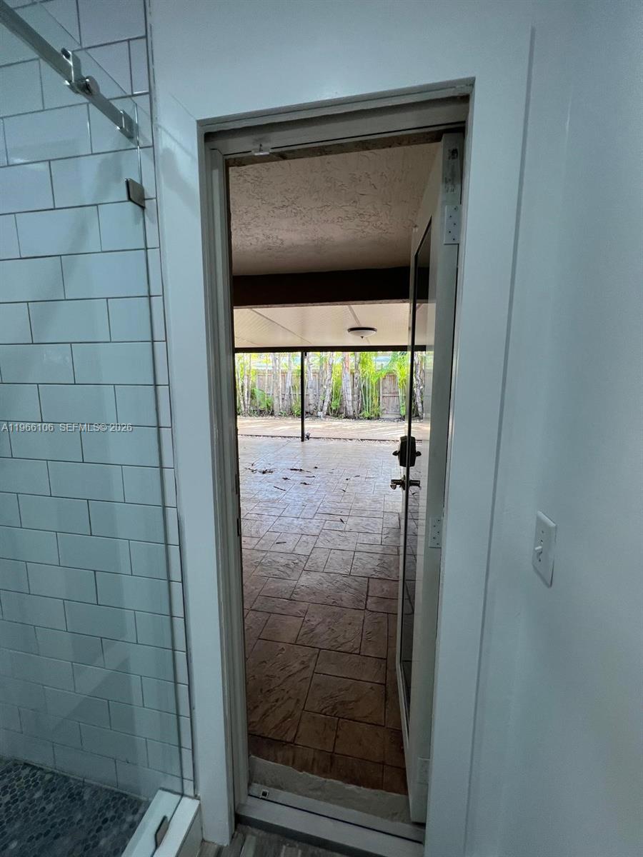 11320 Southwest 245th Street Homestead, FL 33032 - Photo 15 of 21 a bathroom with a shower