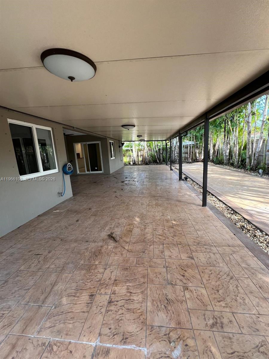 11320 Southwest 245th Street Homestead, FL 33032 - Photo 21 of 21 a view of empty room with floor to ceiling window