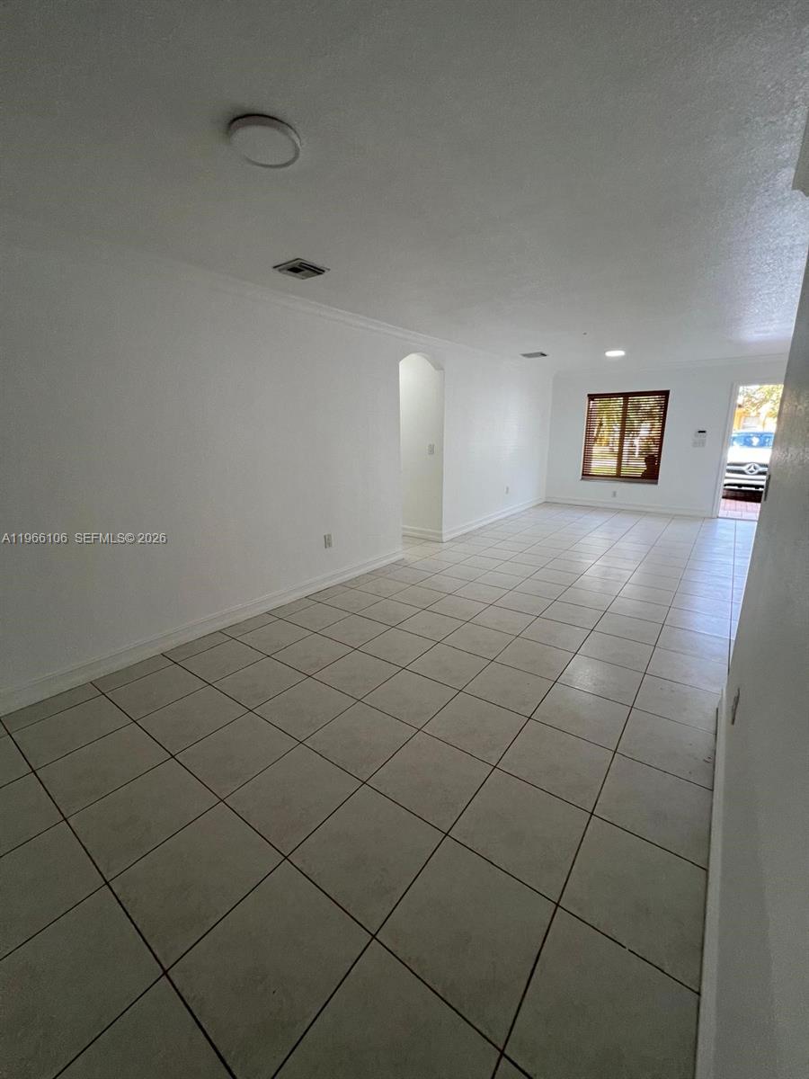 11320 Southwest 245th Street Homestead, FL 33032 - Photo 6 of 21 a view of a livingroom and window