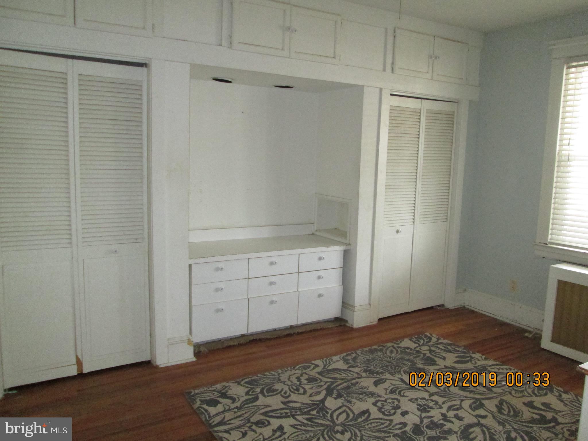 604 Orpington Road Baltimore, MD 21229 - Photo 8 of 9 Bedroom on main floor with built in .