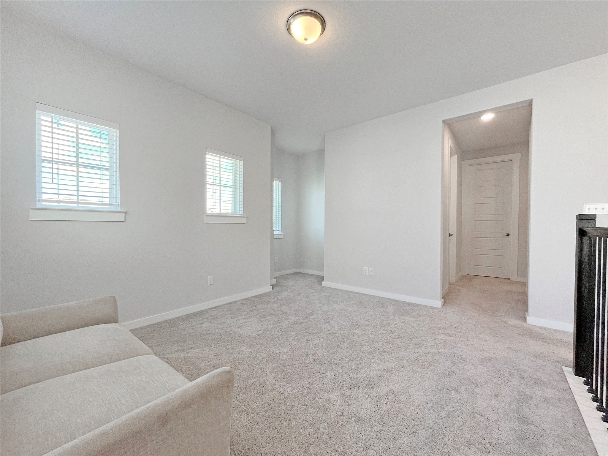 1200 Willie Rnch Way Leander, TX 78641 - Photo 10 of 25 Unfurnished living room with light colored carpet and baseboards