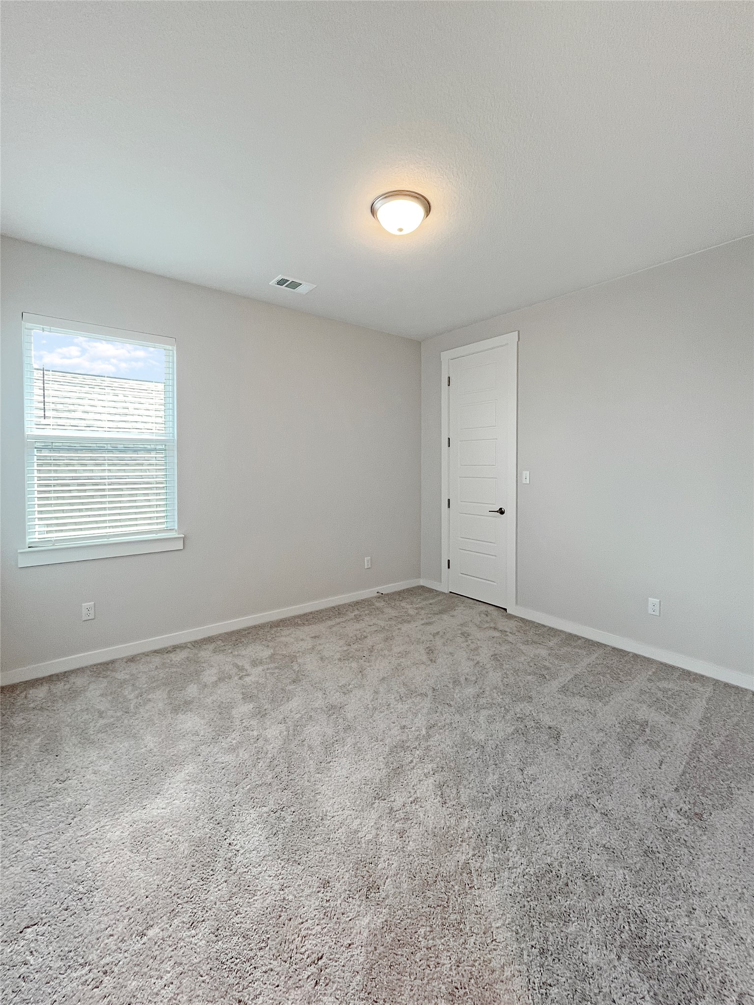 1200 Willie Rnch Way Leander, TX 78641 - Photo 15 of 25 Carpeted spare room with baseboards