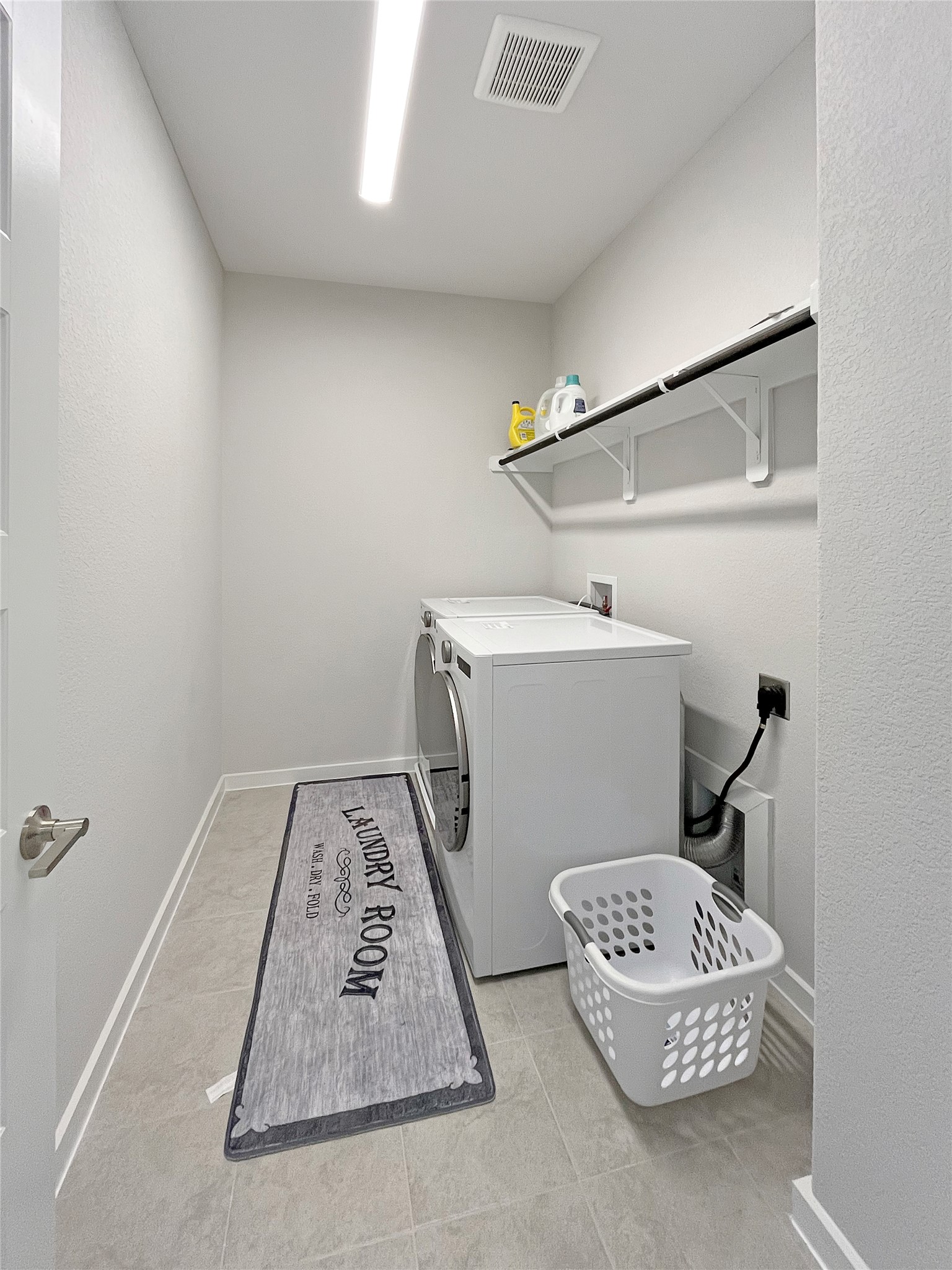 1200 Willie Rnch Way Leander, TX 78641 - Photo 20 of 25 Washroom with washer and clothes dryer
